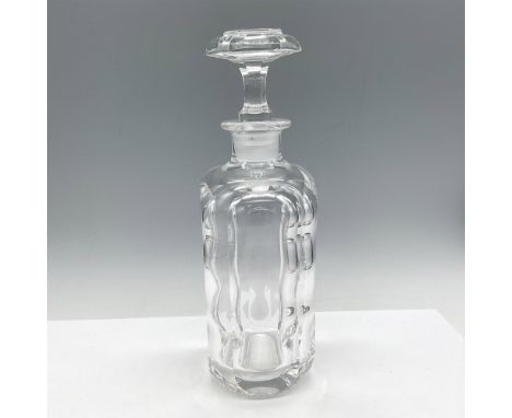 Heavy cut crystal bottle with windowpane cuts that create a 3D effect. Crystal stopper has wide flat head. Artist: Sven Palmq