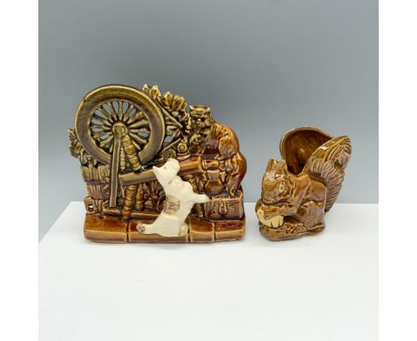 Adorable vintage duo of plant holders that depict a squirrel holding an acorn and a Scottish dog next to a spinning wheel. La