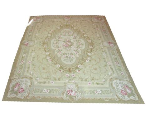 FINE SAVONNERIE AUBUSSON NEEDLEPOINT CARPET, 294cm x 240cm, cartouche medallion of floral sprays on jade field of scrolling v