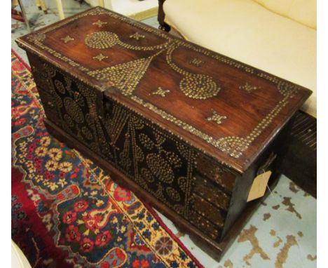 ZANZIBAR TRUNK, late 19th/early 20th century, Moorish, hardwood and brass studded, with hinged top, 100cm x 43cm x 47cm. 