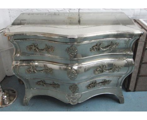 BOMBE COMMODE, in polished silver metal with three drawers on short cabriole legs, 120cm x 63cm x 92cm H.
