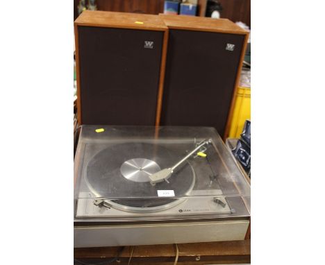A LENCO LEAK DELTA RECORD PLAYER TOGETHER WITH A PAIR OF WHARFEDALE SPEAKERS (UN-TESTED)
