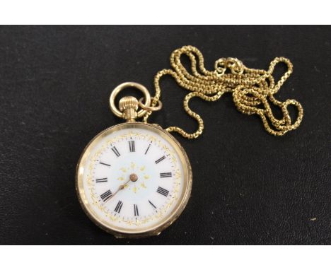 A CONTINENTAL YELLOW METAL OPEN FACE MANUAL WIND FOB WATCH ON A HALLMARKED 9 CARAT GOLD CHAIN 