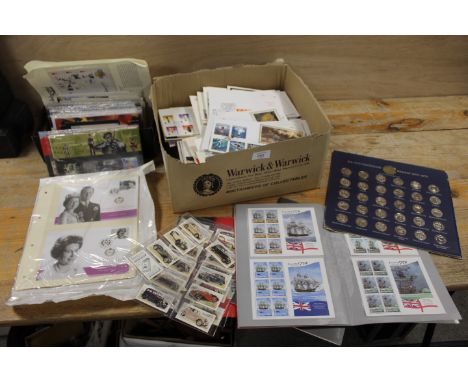 A TRAY OF FIRST AID COVERS, CIGARETTE CARDS ETC