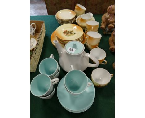 Victoria china teaset for 8 people decorated with country cottage scenes and a Poole Pottery teapot and 6 cups and saucers 