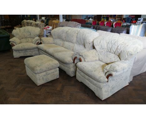 3 seater settee in cream and leaf floral patterned material together with matching pouffe 