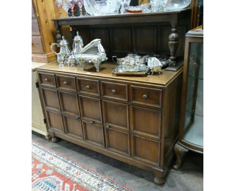1950s 4' oak sideboard with fielded panel drawers and doors with low shelf back 