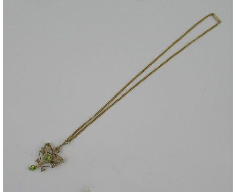 A 9ct gold and split pearl brooch/pendant, suspended on a 15ct gold cub link chain, weight 11.5g, in case&nbsp;