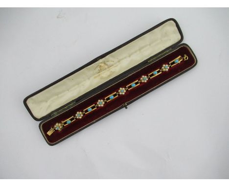 A Victorian 15ct gold bracelet, formed as pearl and turquoise flower heads with rectangular links set with a turquoise, weigh