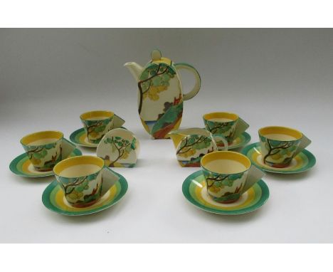 A Clarice Cliff Bizarre coffee service, comprising coffee pot, sugar bowl, jug, six cups and saucers - The coffee pot is craz