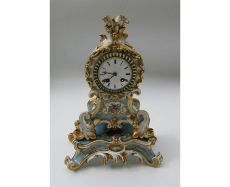 A French porcelain mantel clock, Rain Co, decorated with flowers to a blue and gilt ground, height 13ins&nbsp; &nbsp;