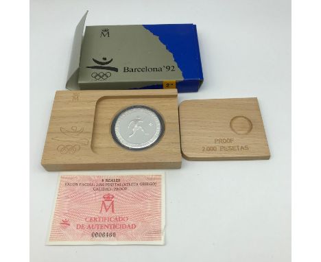 Silver Proof 2000 Pesetas Barcelona Olympics 1992 coin with wooden box, certificate and original box sleeve. 