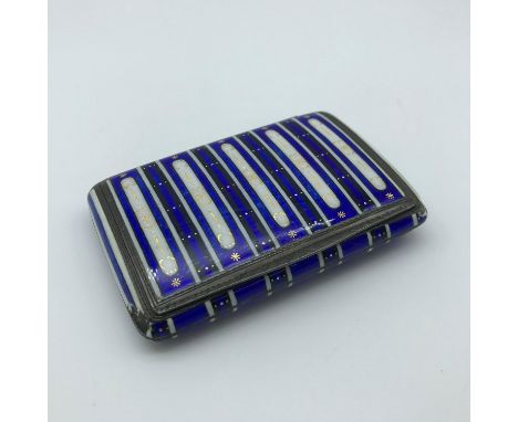 Antique Russian Silver 935 and enamel cigarette case. Impressive gilt, white and blue enamel design. Measures 1.5x8x5.4cm 