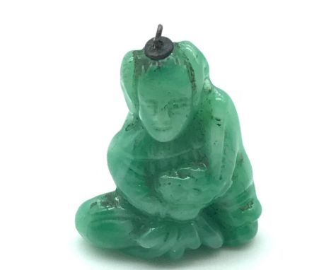 A Miniature Chinese jade sitting figure charm. Measures