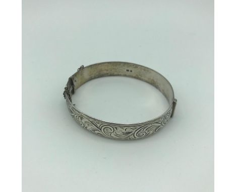 A Heavy London silver ornate bangle. 