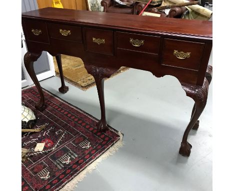 Antique reproduction narrow console table, Fitted with 5 various sized drawers and supported on ball and claw feet, Measures 