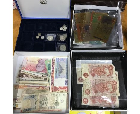 A mixed lot of world banknotes, together with silver coins 