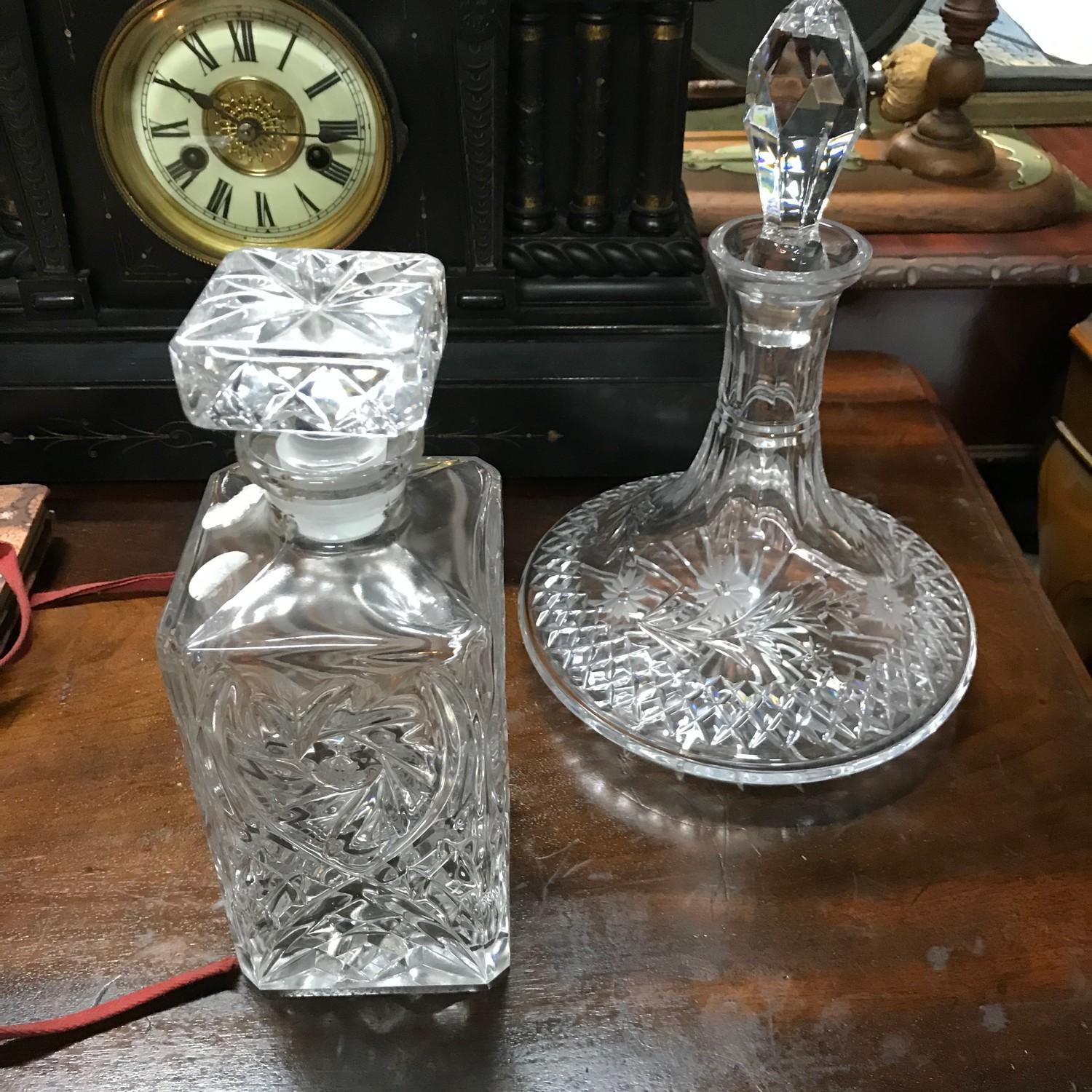 An Edinburgh crystal ships decanter together with a cut crystal decanter