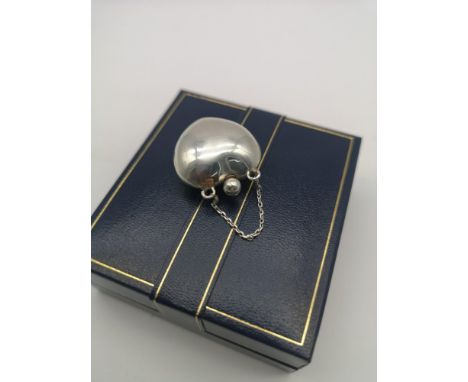 A unmarked silver heart shaped perfume bottle pendant. 