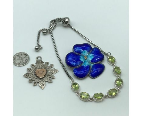 A Lot of Sterling silver jewellery which includes silver and enamel flower design brooch, Chester silver fob medal, Sterling 