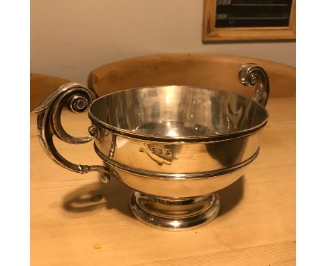 An Edinburgh silver two handle large trophy. Makers Wilson &amp; Sharp Edinburgh, dated 1907. Measures 12.5x23x15cm. Total we