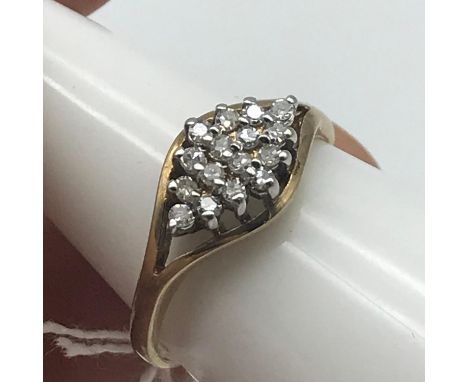 A Birmingham 9ct gold ladies Diamond cluster ring. 0.19ct of diamonds. Ring size M 1/2 and weighs 2.4grams 