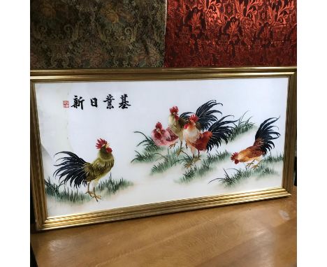 A Large oriental silk tapestry which depicts cockerels. Fitted within a large gilt frame. Frame Measures 76x142cm 