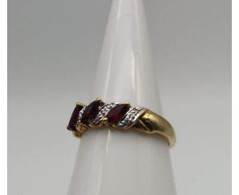 A Ladies 9ct gold, diamond and pink stone ring, Ring size N and weighs 2.2grams 