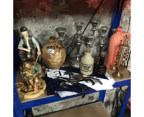 Shelf of collectable odds, to include; candelabras, stone whisky flagon &amp; porcelain miner figurine 