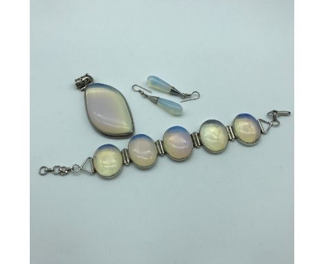 A Beautiful example of a moon stone jewel set, Consists of 5 stone &amp; 925 silver bracelet, silver and large moonstone pend