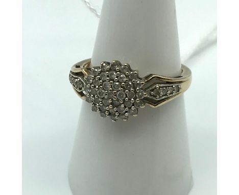 A Lovely example of a Ladies Birmingham 9ct gold Diamond cluster ring [0.50Ct diamonds] [Ring size P] [2.9 grams] 