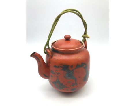 A 19th century Japanese Eiraku Meiji Period tea pot, has green weaved handle, Designed with gold/ silver dragons and trims ag