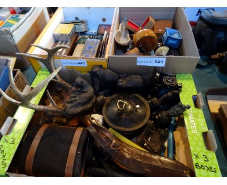 A large quantity of assorted items to include: cribbage boards, vintage tin, dominoes, fans, a box camera, hardwood elephants