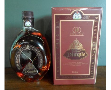 A bottle of Dimple De Luxe Scotch Whisky, aged 15 years, in original box, 1L, 43% vol.