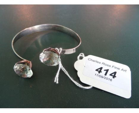 A Scandinavian silver and crystal glass double ended bangle, marked 925 and signed Lindstrom. Condition Report: It appears in