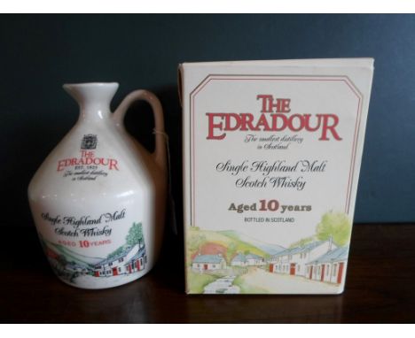 A ceramic bottle of Edradour Single Highland Malt Scotch Whisky, aged 10 years, in original box, bottled in the 1980s, 75cl, 