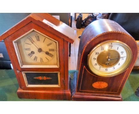 An Edwardian inlaid dome topped mantle clock, the brass and enamel dial bearing Arabic numerals, together with a Continental 
