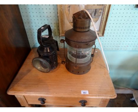 A 20th century converted ship's light, the case marked Ankerlight, together with an early 20th century carriage lamp.