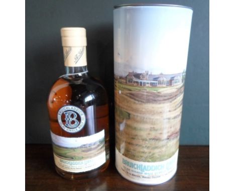A bottle of Bruichladdich Links Islay Single Malt Scotch Whisky, the label picturing the 18th green at Royal Troon, aged 14 y
