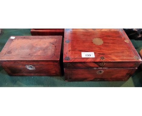 A late 19th/early 20th century mahogany tea caddy, having twin interior compartments with covers (later modified), together w
