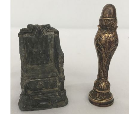 A metal acorn and oak leaf decorated wax seal stamp. Letter to base is decorative V. Together with a vintage lead miniature c