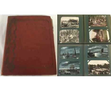 A vintage red postcard album. Containing postcards of Rural British village scenes and portraying period clothing, trams, hop