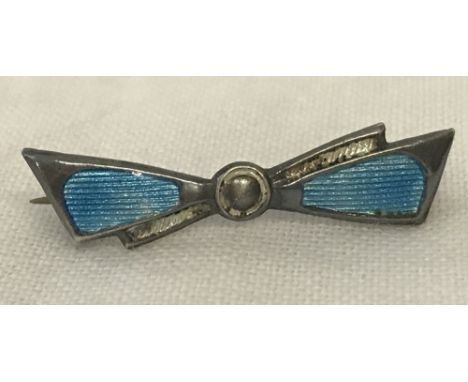 A small Charles Horner silver bow brooch with blue and white guilloche enamel decoration. CH mark to back also marked sterlin