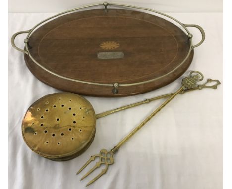 A vintage inlaid tray with presentation plaque and gallery. Together with a vintage brass nut roaster and toasting fork. 