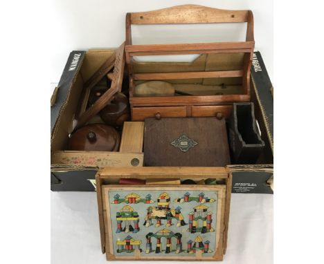 A box of assorted wooden items. To include lidded boxes, boxed set of vintage children's building blocks and vintage pencil b