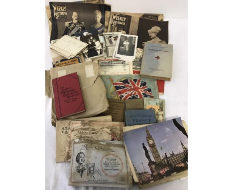 A small quantity of vintage ephemera. To include 2 copies of 1935 Weekly Illustrated, cigarette card albums, postcards and ma