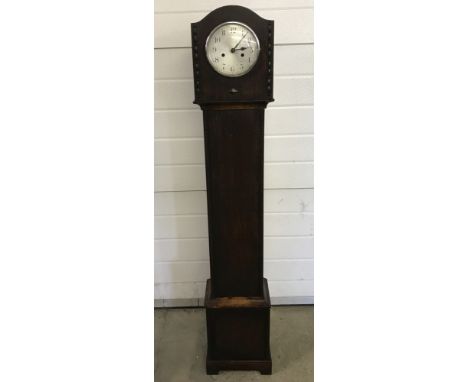 A dark wood cased vintage granddaughter clock with beading detail to case. Complete with pendulum and key. Approx. 136cm tall