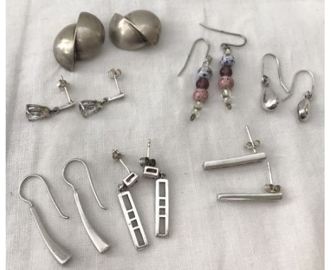 7 pairs of silver and white metal earrings. To include stone set and vintage clip on. 