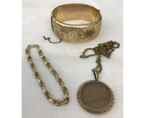 A 9ct gold metal core vintage bracelet with engraved detail. Together with a rolled gold vintage double sided locket and a go