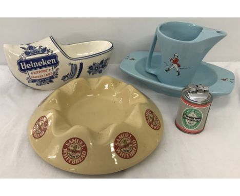 A small collection of breweriana. Comprising Johnny Walker water jug and ash tray, Samuel Whitbread ashtray, A Heineken Expor